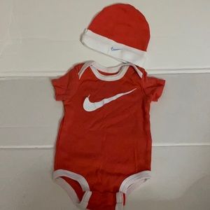 Nike onesie with matching logo cap